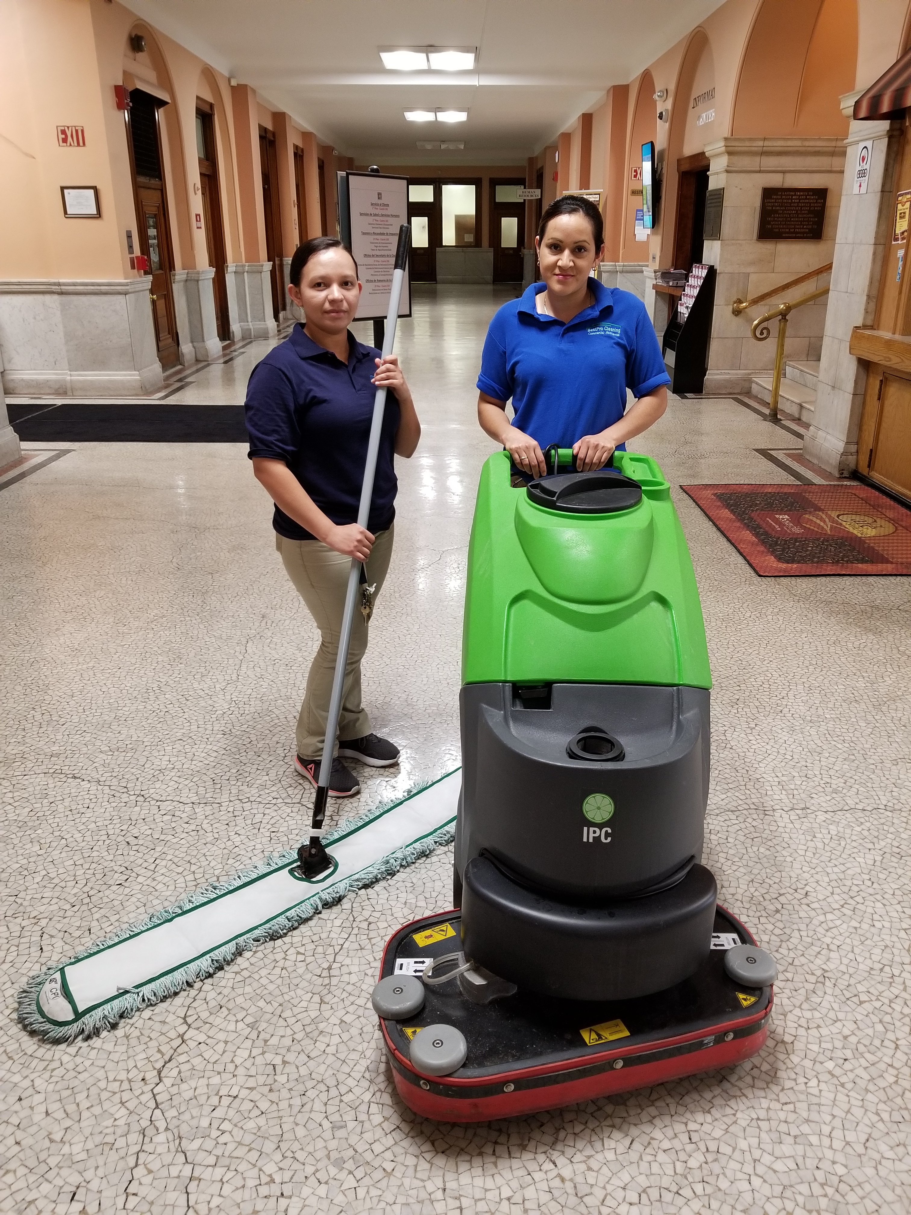 BestPro Cleaning crew at City Hall with a microfiber mop and a HEPA-filter vacuum